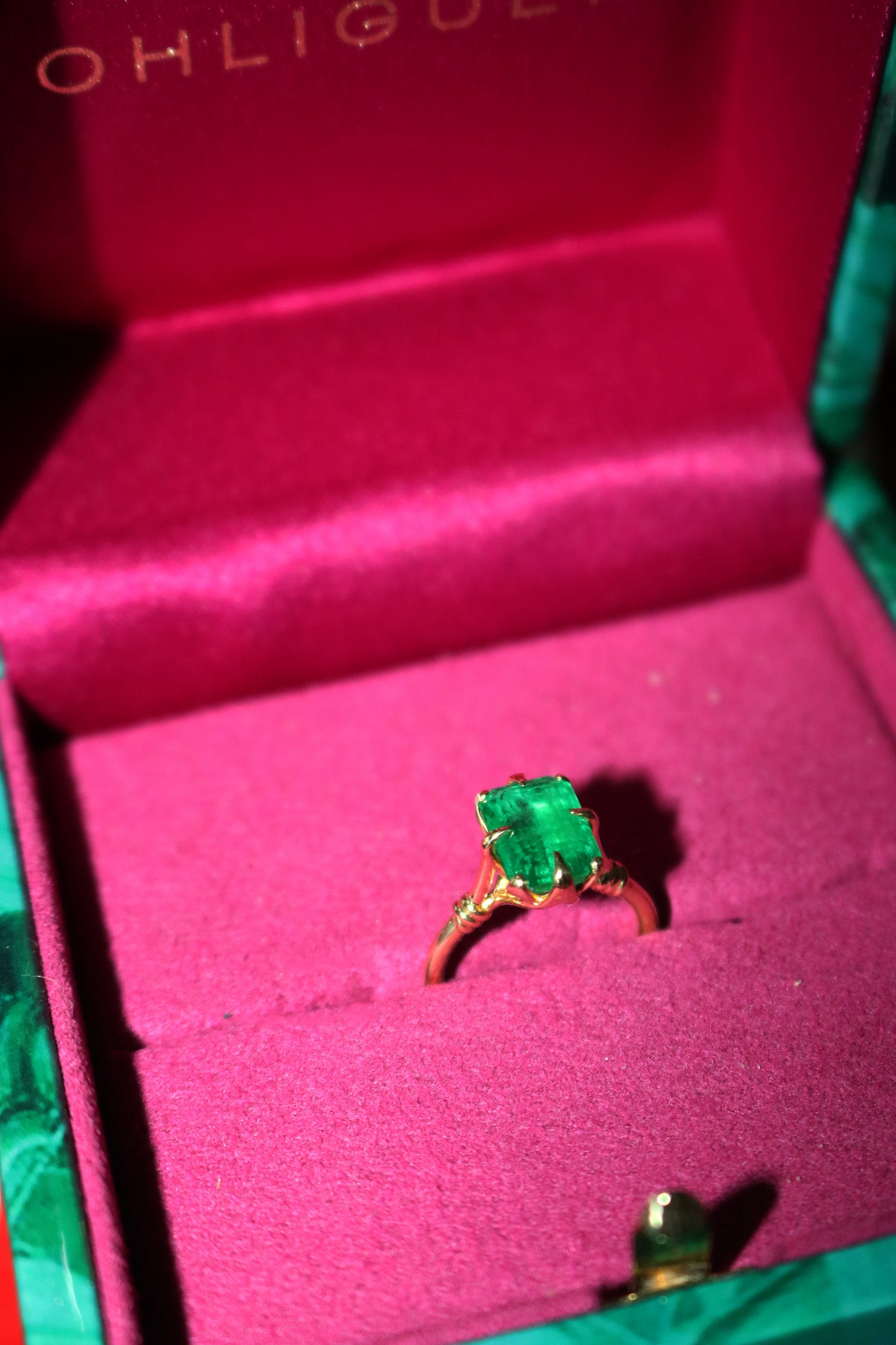 One of a Kind 2ct Forget Me Knot Emerald ring with Petals