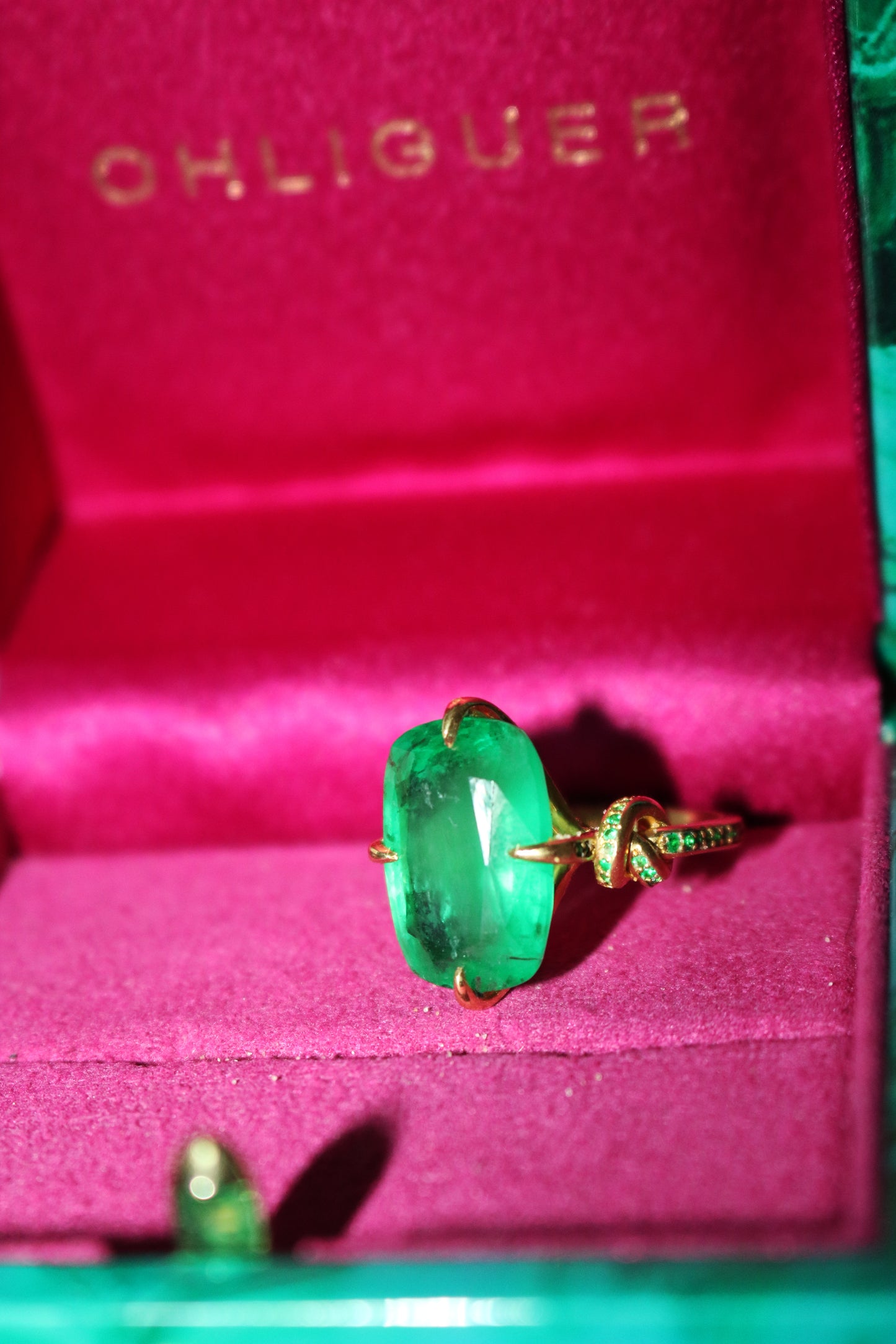 One Of A Kind 12.68ct Cushion Cut Emerald Forget Me Knot ring with emeralds