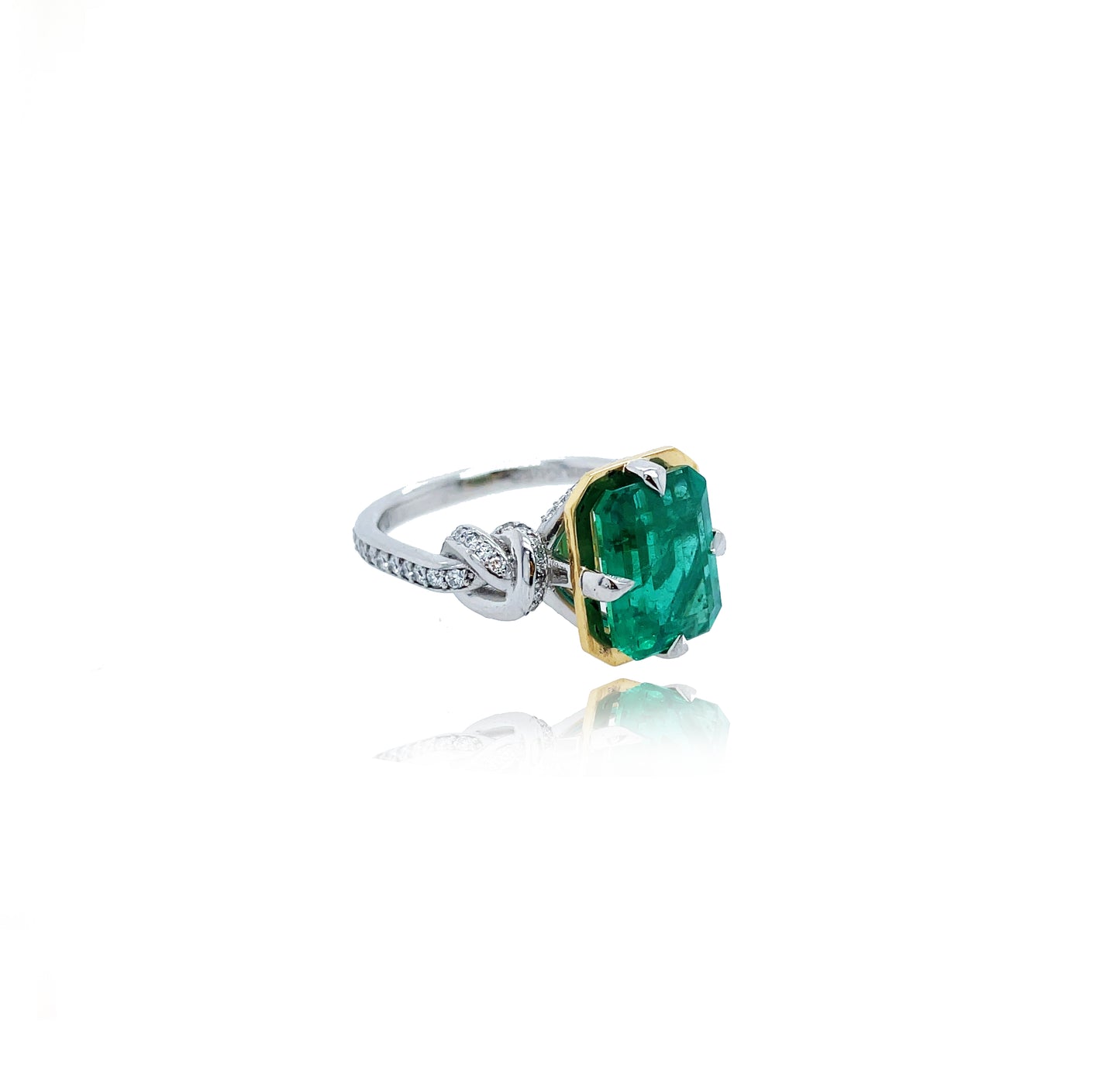 One of a Kind 4ct Emerald Forget Me Knot Emerald Cut ring in 22ct Yellow Gold & Platinum