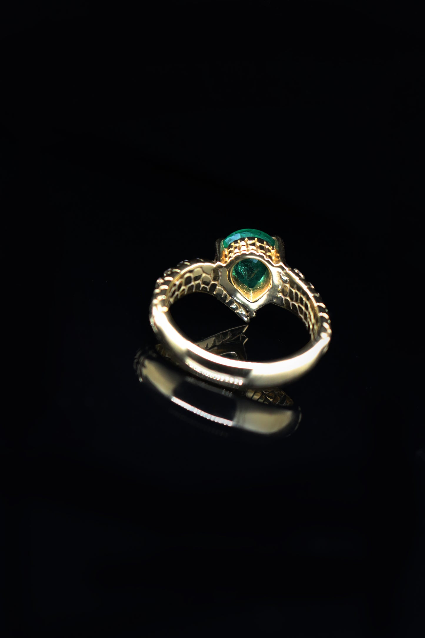 One of a Kind Croc Tail ring with 1.57ct pear cut Emerald with diamond spikes