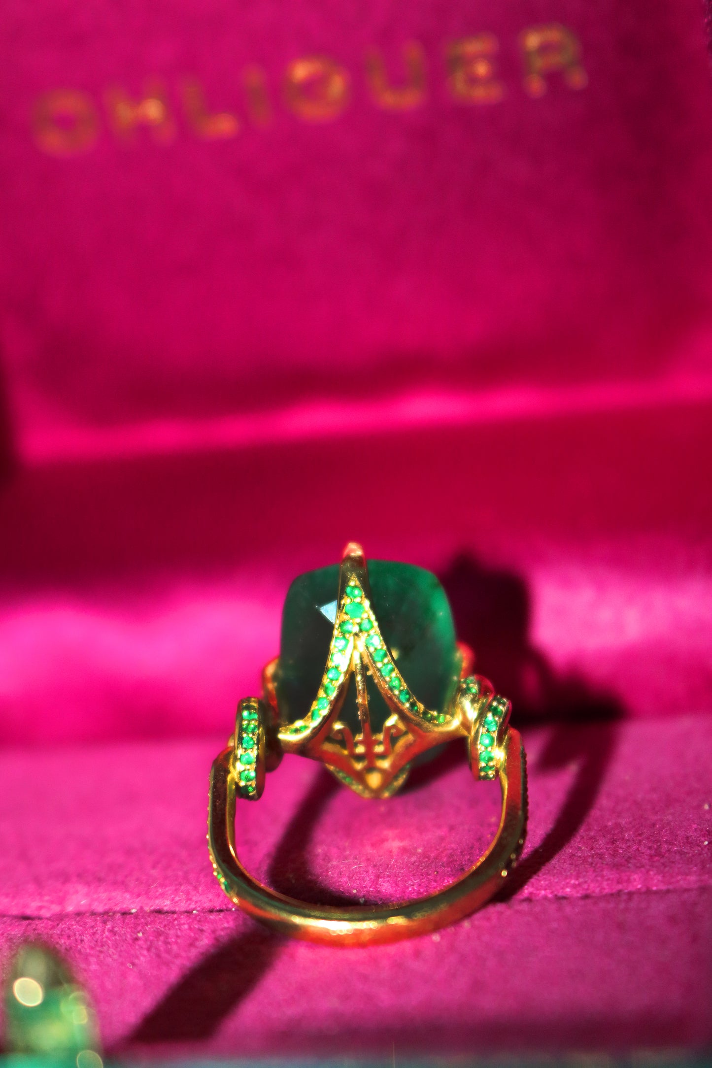 One Of A Kind 12.68ct Cushion Cut Emerald Forget Me Knot ring with emeralds