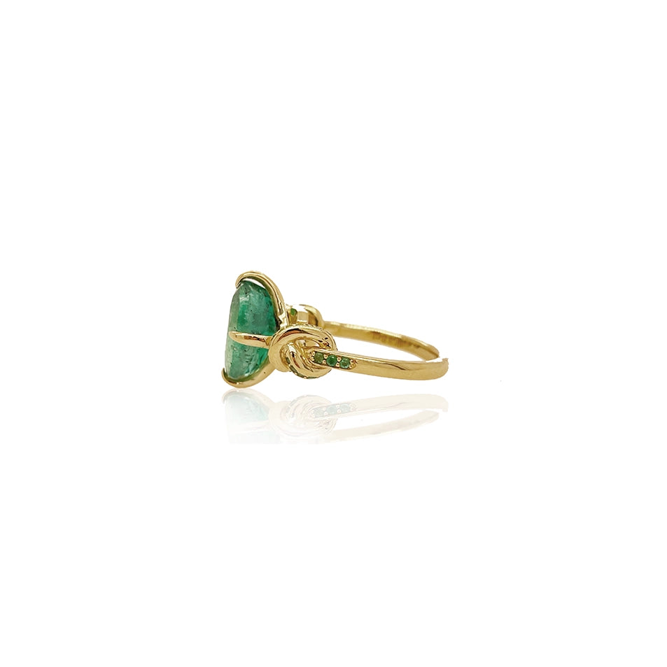 One of a Kind Oval Cut Emerald Forget Me Knot ring with Emeralds in 18ct yellow gold