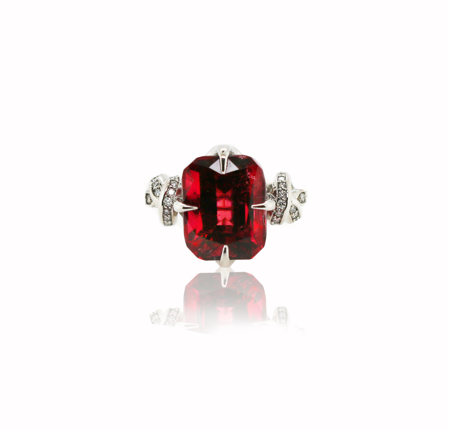 Forget Me Knot Emerald Cut Rubelite ring in platinum and diamonds