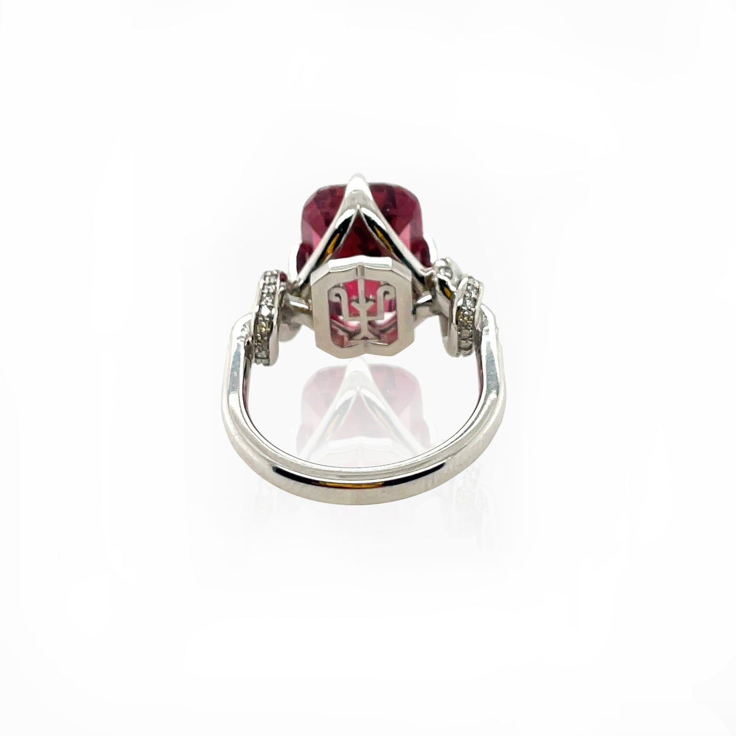 Forget Me Knot Emerald Cut Rubelite ring in platinum and diamonds