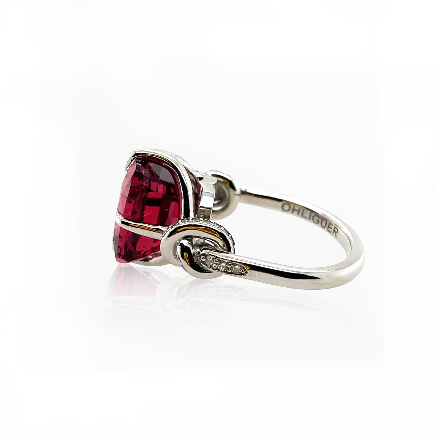 Forget Me Knot Emerald Cut Rubelite ring in platinum and diamonds
