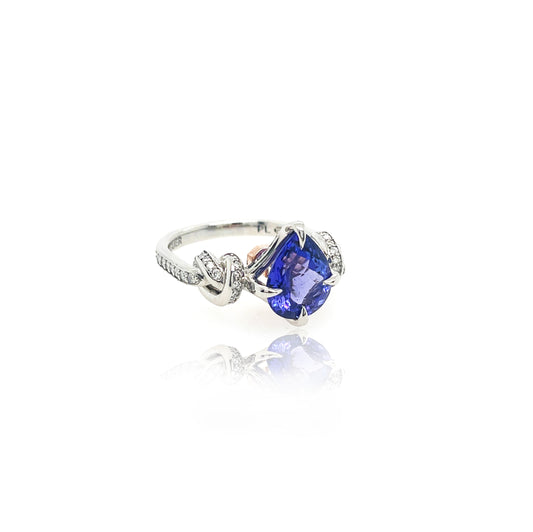 Pear Cut Tanzanite Forget Me Knot ring in platinum and rose gold