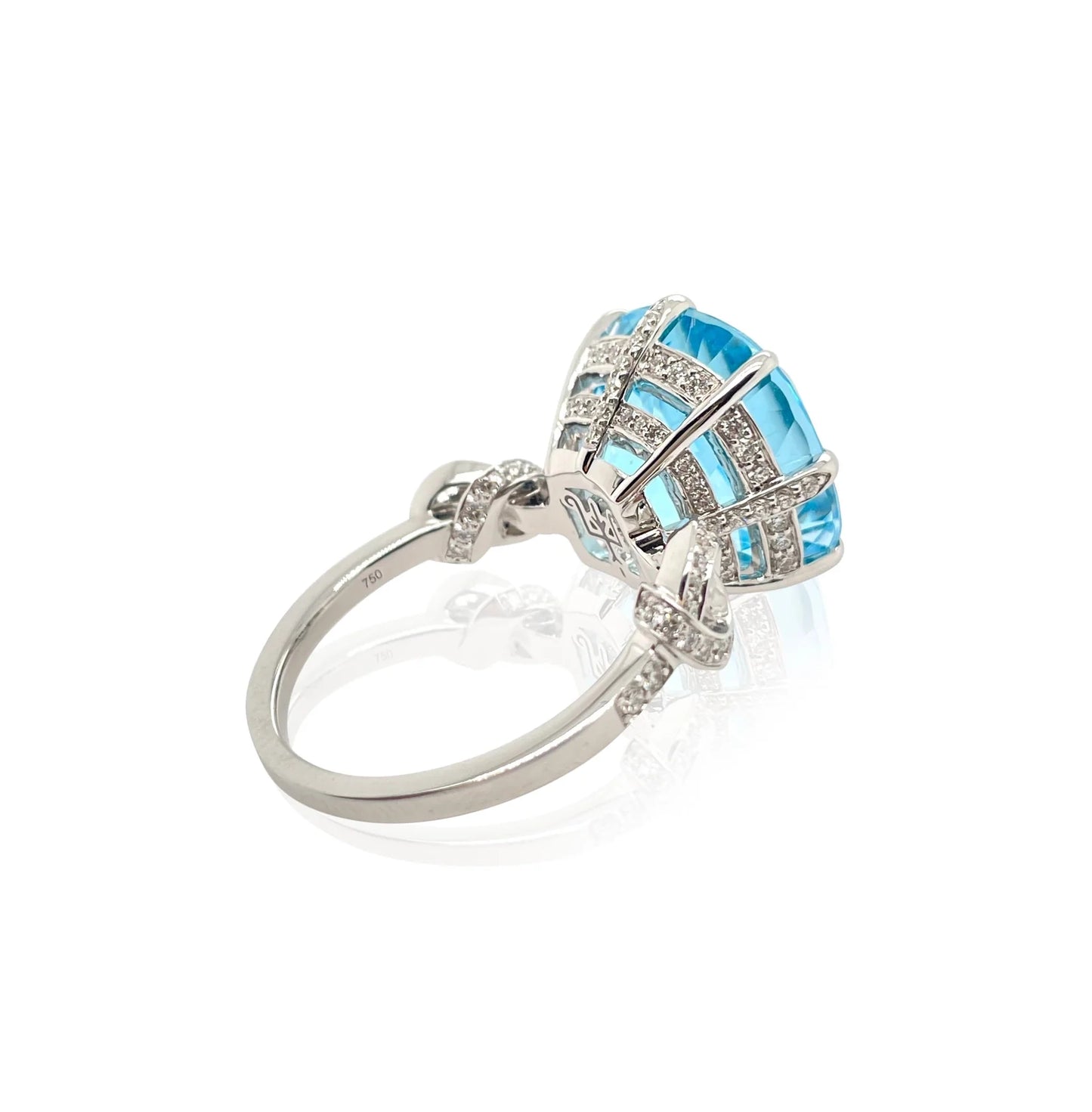 Forget Me Knot Topaz and Diamond ring in 18ct White Gold