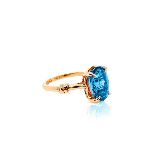 Forget Me Knot London Blue Topaz Ring in 18ct Yellow Gold