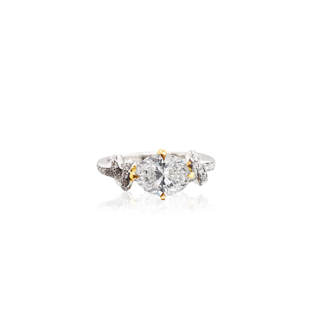 Forget Me Knot Oval Cut Diamond ring with 18ct Yellow Gold Petals & Platinum