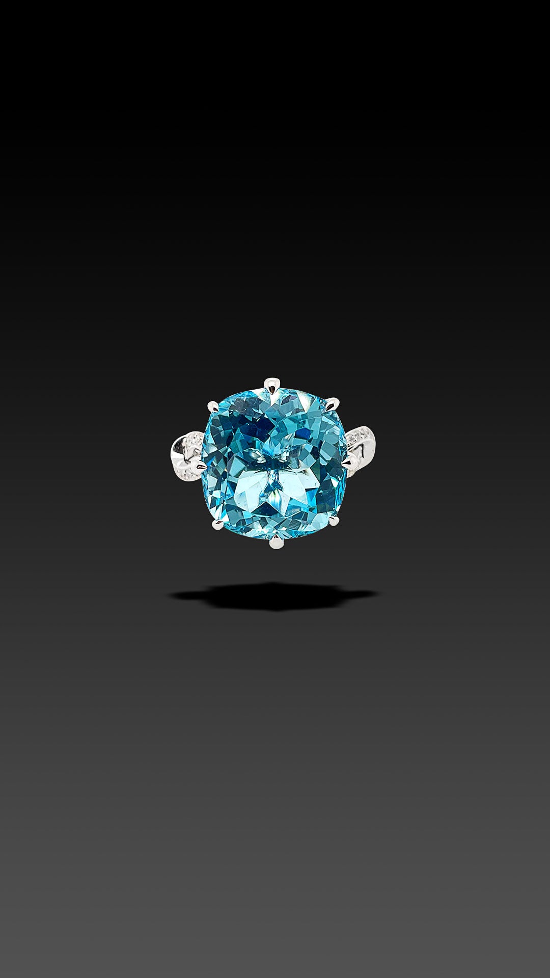 Forget Me Knot Topaz and Diamond ring in 18ct White Gold
