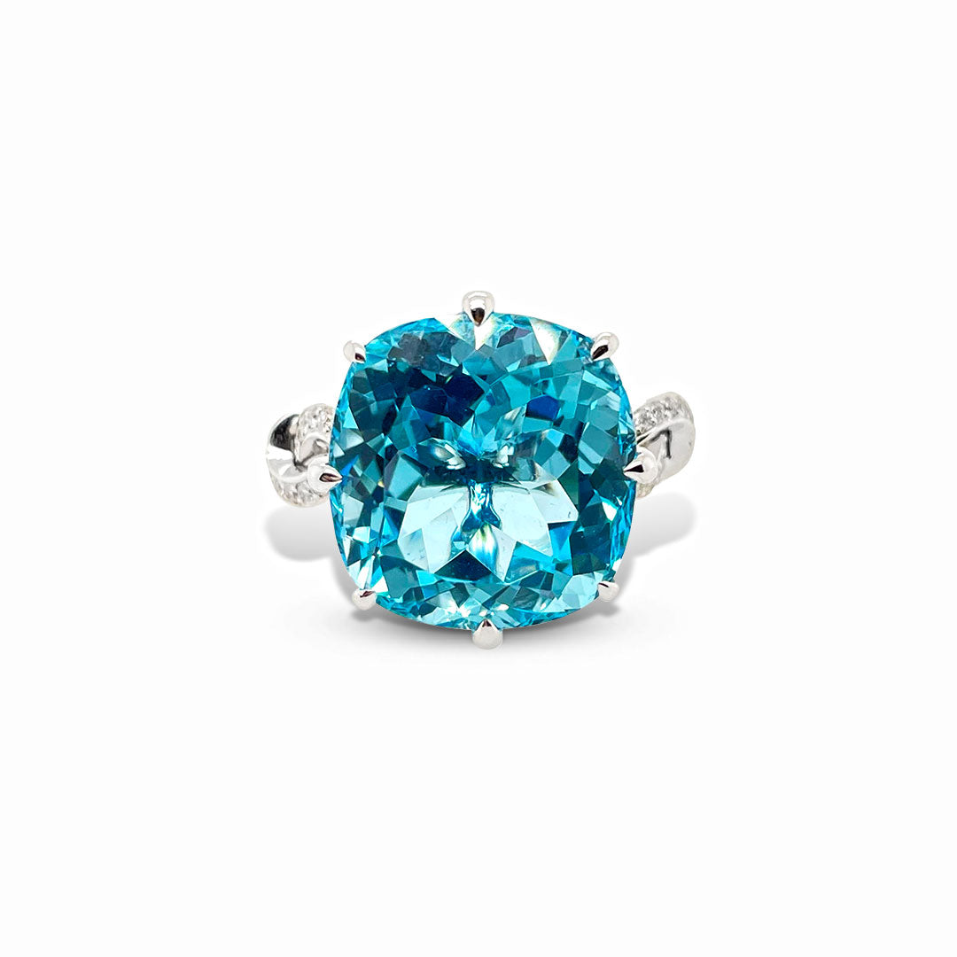 Forget Me Knot Topaz and Diamond ring in 18ct White Gold