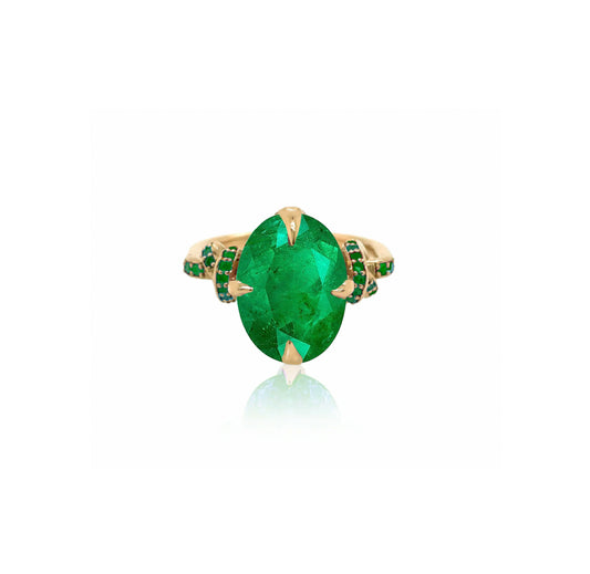 Forget Me Knot ring with Emeralds in 18ct yellow gold