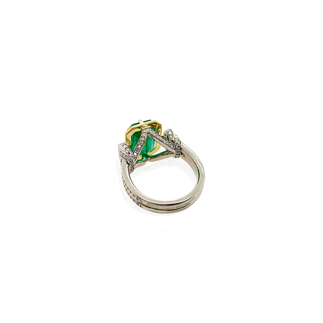 2ct Reef Knot in Emerald, platinum and 22ct yellow gold and diamonds