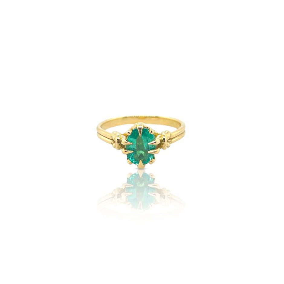 Oval Cut Emerald in  Reef Knot ring in 18ct Yellow Gold