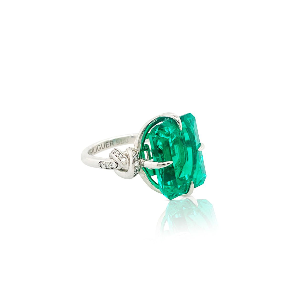 One of a Kind 8ct Forget Me Knot Emerald ring with Diamonds in Platinum