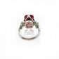 Forget Me Knot Emerald Cut Rubelite ring in platinum and diamonds