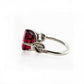 Forget Me Knot Emerald Cut Rubelite ring in platinum and diamonds
