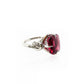 Forget Me Knot Emerald Cut Rubelite ring in platinum and diamonds